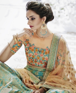 Beige Net Thread Embroidered A Line Lehengas