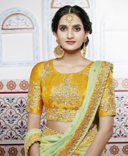 Mustard Raw Silk Zari Embroidered A Line Lehengas